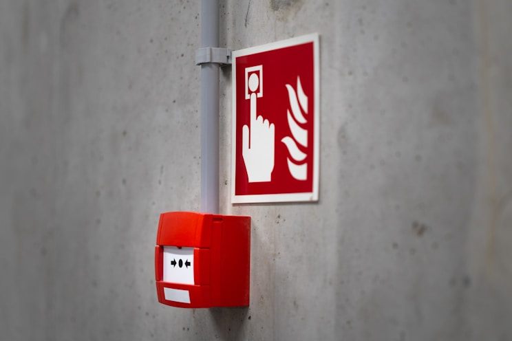 Fire alarm system and notification devices on a facility wall