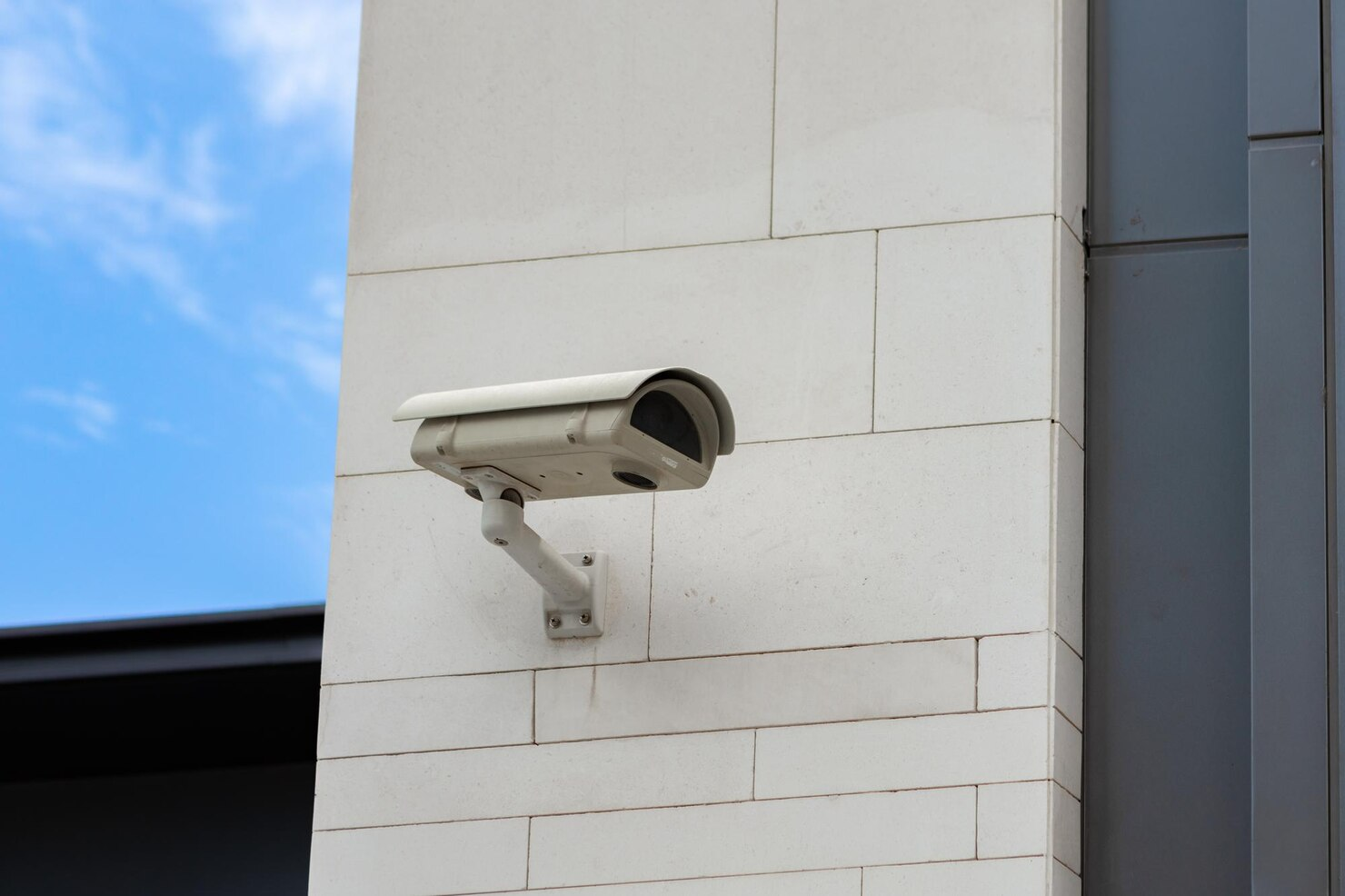 Building exterior with security camera installation